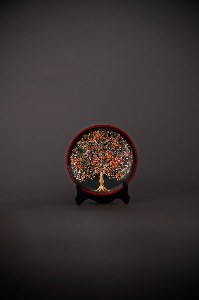 Discover the Tree of Life Hand-Painted Mexican Decorative Plate from Mexico’s Finest. Crafted by artisans, this lacquered wood piece features flowers, mockingbirds, and butterflies in vivid Mexican folk art detail. 
Hand-crafted in Pátzcuaro, Michoacán, Mexico.
