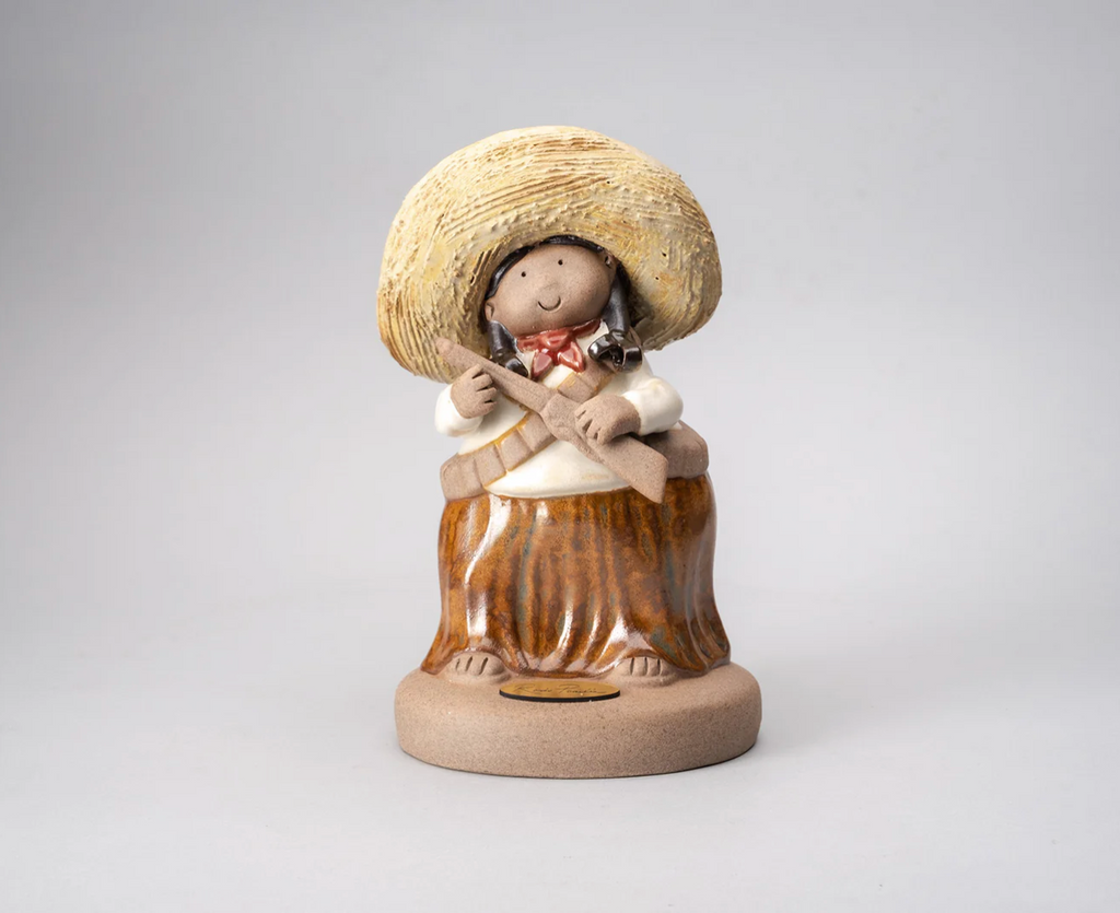 "Adelita ceramic sculpture by Rodo Padilla featuring a soldadera figure with braids, handcrafted in Mexico – Mexican folk art decor" 19 x 9 x 11 cm (approx. 7.48 x 3.54 x 4.33 inches)