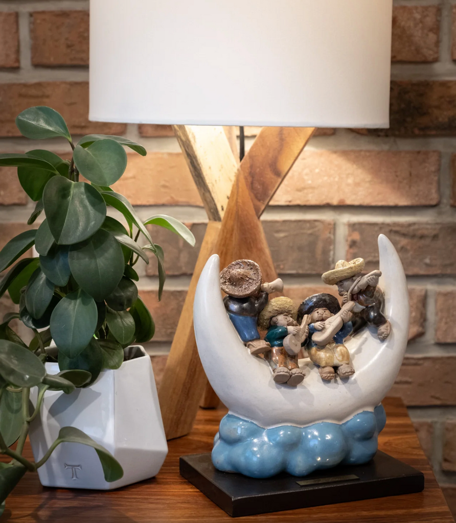"Handmade ceramic sculpture Mariachis Llevando Serenata by Rodo Padilla featuring four mariachi musicians sitting on a crescent moon playing their instruments – Mexican folk art decor" 23 x 14 x 26 cm (approx. 9.06 x 5.51 x 10.24 inches)