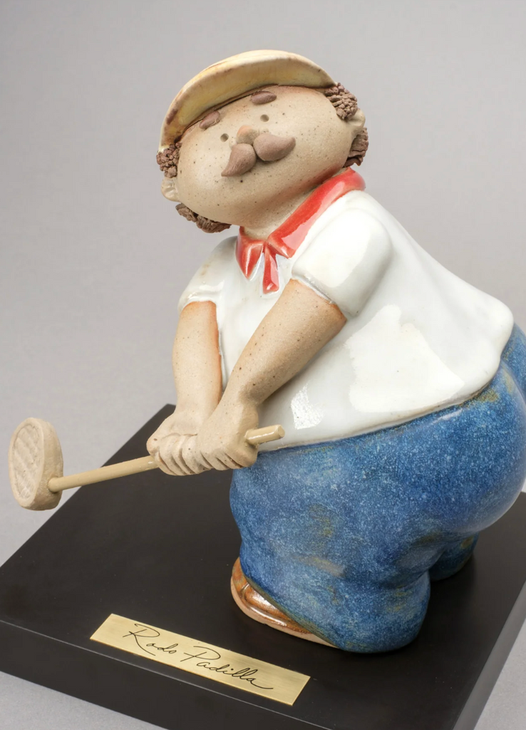 Golf Lover handmade ceramic golf sculpture by Rodo Padilla featuring a golfer mid-swing, handcrafted and hand-painted in Tlaquepaque, Mexico.