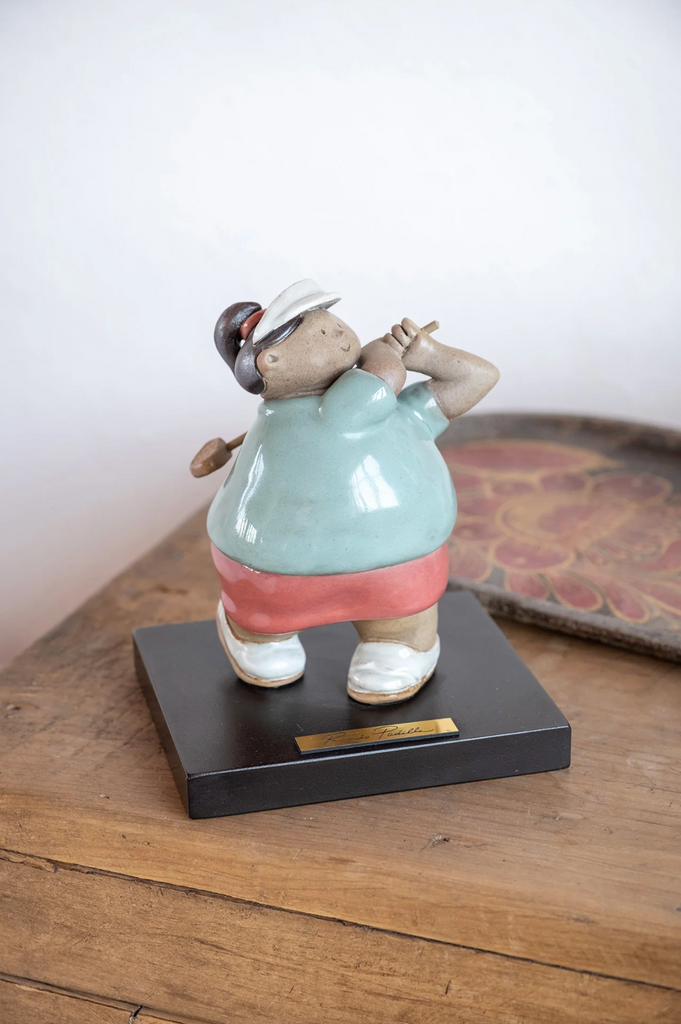 Handmade ceramic sculpture of a female golfer mid-swing by Rodo Padilla – “Mujer Golfista ” 18 x 13 x 14 cm (approx. 7.09 x 5.12 x 5.51 inches